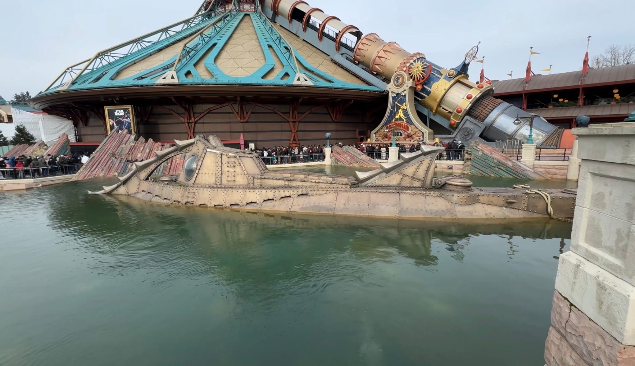 The Space Mountain building with the Nautilus submarine sculpture in the moat at Discoveryland, Disneyland Paris